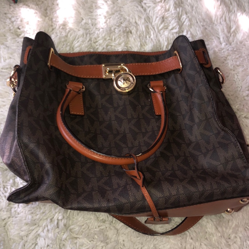 Brown Michael Kors bag with lock and key!